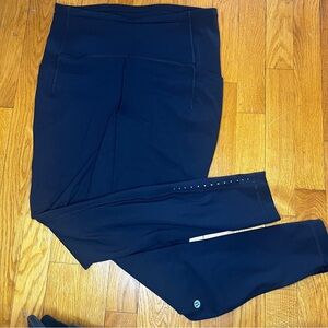 Lululemon running legging with pockets, drawstring. 28 inseam. Black. Size 8.